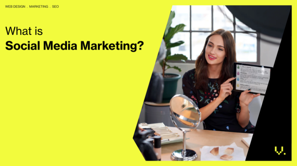 A woman sits at a table, holding up a tablet displaying text about social media marketing. Surrounded by makeup items and a mirror, the room's split yellow backdrop poses the question "What is Social Media Marketing?" Perfect for Australia’s SMEs. A plant and window add to the ambiance. | Ven Agency
